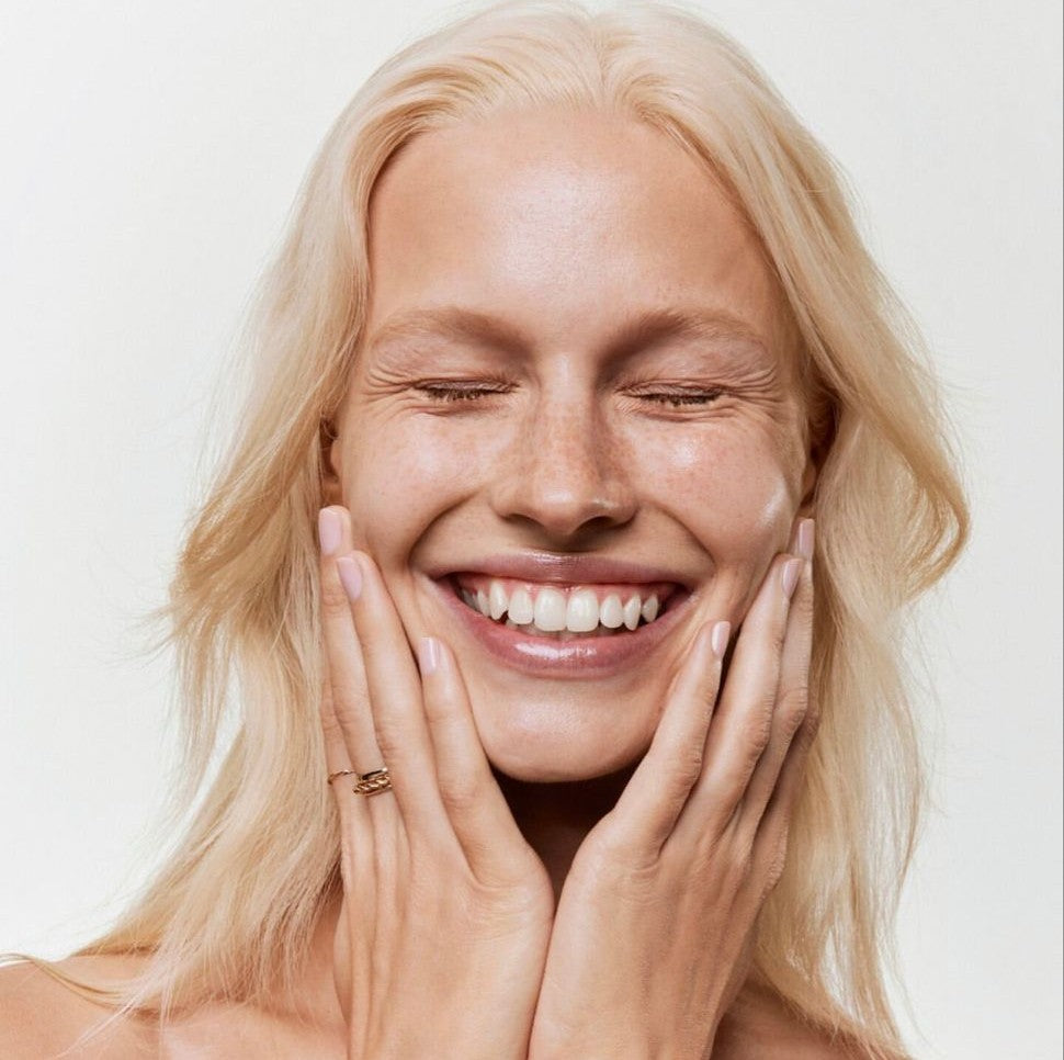 happy woman with healthy skin