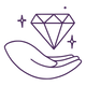 Hand holding a sparkling diamond