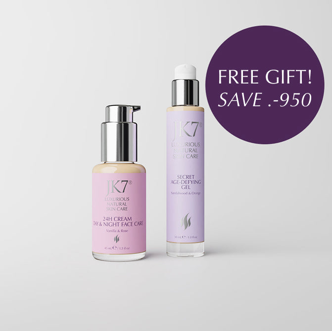 Two skincare bottles with a free gift offer on a light gray background

